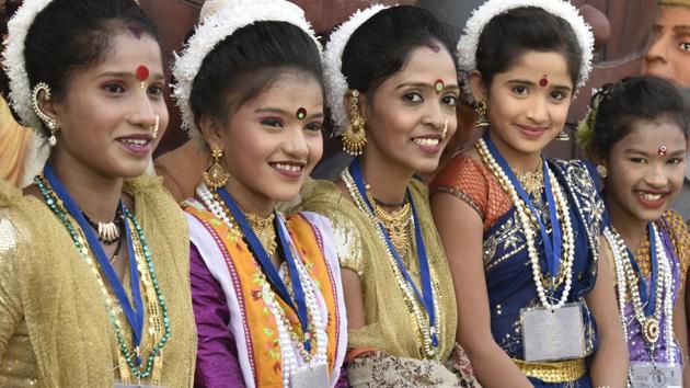 Artists from Maharashtra rest after their performance. The crafts mela with 50 stalls will showcase the diverse handicrafts of the country, arranged by the State Governments and ministry of textiles through the office of the development commissioner of handicrafts. (Raj K Raj/HT PHOTO)