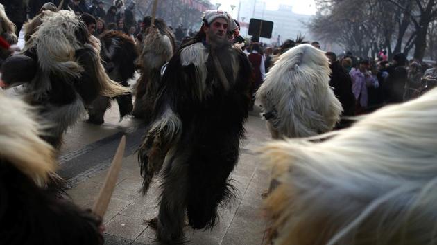 A dancer wearing costume made of animal fur takes part in the International Festival of Masquerade Games on Sunday. (REUTERS) A dancer wearing costume made of animal fur takes part in the International Festival of Masquerade Games on Sunday. (REUTERS)