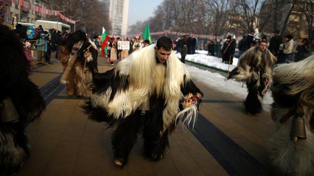 A dancer wearing costume made of animal fur takes part in the International Festival of Masquerade Games on Sunday. The three-day festival, which started on Friday, has participants sporting multi-coloured masks, covered with beads, ribbons and woolen tassels while the main dancer, ladened with bells to drive away sickness and evil spirits, sways like a wheat spikelet heavy with grain. (REUTERS) A dancer wearing costume made of animal fur takes part in the International Festival of Masquerade Games on Sunday. The three-day festival, which started on Friday, has participants sporting multi-coloured masks, covered with beads, ribbons and woolen tassels while the main dancer, ladened with bells to drive away sickness and evil spirits, sways like a wheat spikelet heavy with grain. (REUTERS)