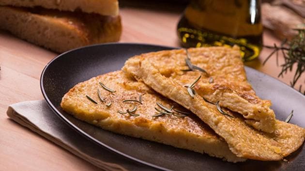 Farinata, Italy: This Genoan recipe is a veritable institution in Italy. Farinata is a savory pancake made from chickpea flour, water, salt and oil, which is cooked in a wood-fired oven. Each region has its own variants and preferences for Farinata, which can be eaten with pesto or gorgonzola, spread on the pancake straight from the oven. (Istock.com) Farinata, Italy: This Genoan recipe is a veritable institution in Italy. Farinata is a savory pancake made from chickpea flour, water, salt and oil, which is cooked in a wood-fired oven. Each region has its own variants and preferences for Farinata, which can be eaten with pesto or gorgonzola, spread on the pancake straight from the oven. (Istock.com)