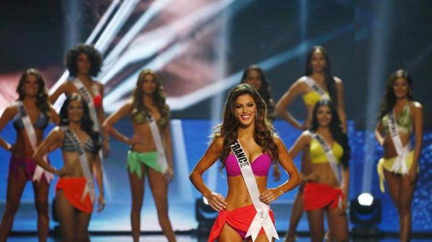 Thirteen contestants were picked for the swimsuit round of the finals after a preliminary competition last week, before being reduced to nine for the evening gown segment. (AP)