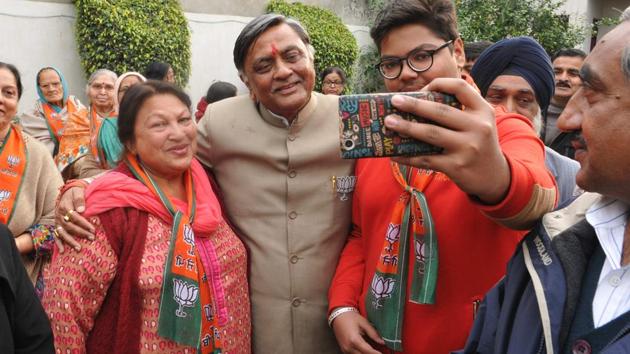 BJP candidate Manoranjan Kalia  with his supporters in Jalandhar on Sunday, (Pardeep Pandit/HT Photo)