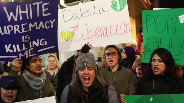 People chant pro-immigrant slogans during a protest held in response to President Donald Trump's travel ban in Seattle, Washington on Sunday. (Reuters) People chant pro-immigrant slogans during a protest held in response to President Donald Trump's travel ban in Seattle, Washington on Sunday. (Reuters)