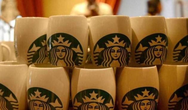 In protest against Donald Trump’s order to ban people from seven Muslim-majority nations, global coffee giant Starbucks has said it will hire 10,000 refugees over the next few years. (AFP) In protest against Donald Trump’s order to ban people from seven Muslim-majority nations, global coffee giant Starbucks has said it will hire 10,000 refugees over the next few years. (AFP)