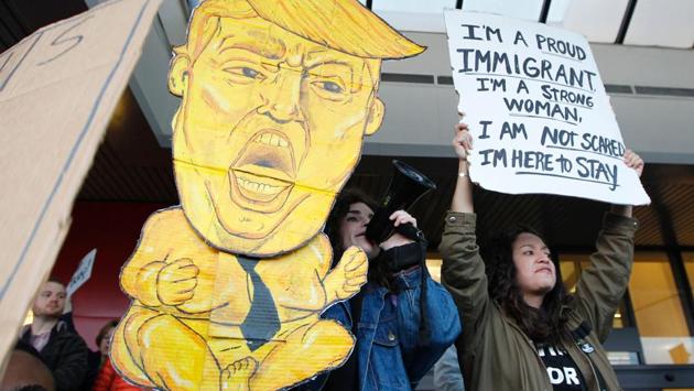Protestors crowd the sidewalks at Hartsfield–Jackson Atlanta International Airport to denounce US President Donald Trump's executive order. (Tami Chappell/AFP) Protestors crowd the sidewalks at Hartsfield–Jackson Atlanta International Airport to denounce US President Donald Trump's executive order. (Tami Chappell/AFP)