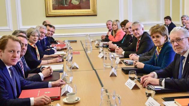 British Prime Minister Theresa May (4L) with members of her Cabinet as she prepares to chair a joint ministerial committee in Cardiff.(AFP photo) British Prime Minister Theresa May (4L) with members of her Cabinet as she prepares to chair a joint ministerial committee in Cardiff.(AFP photo)