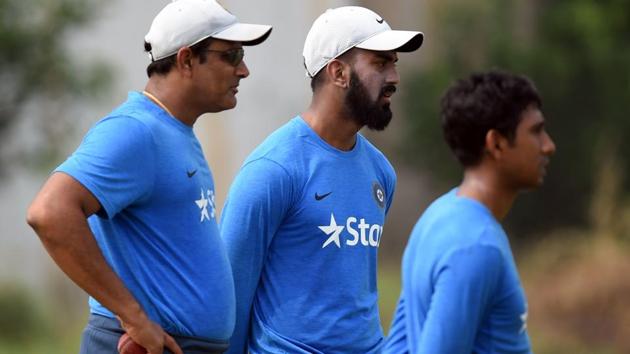 Indian cricket team coach Anil Kumble (left) talks with Lokesh Rahul (centre) and wicketkeeper Wriddhiman Saha during a training session ahead of the second Test against England in Vishakhapatnam on November, 2016.(AFP)