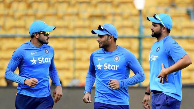 Rishabh Pant and Suresh Raina chat in the practice session at the M Chinnaswamy stadium. (PTI) Rishabh Pant and Suresh Raina chat in the practice session at the M Chinnaswamy stadium. (PTI)