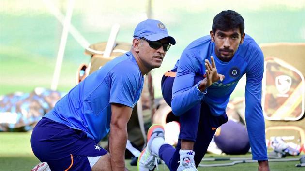 MS Dhoni and Jasprit Bumrah interact during the training session in Bangalore. (PTI) MS Dhoni and Jasprit Bumrah interact during the training session in Bangalore. (PTI)
