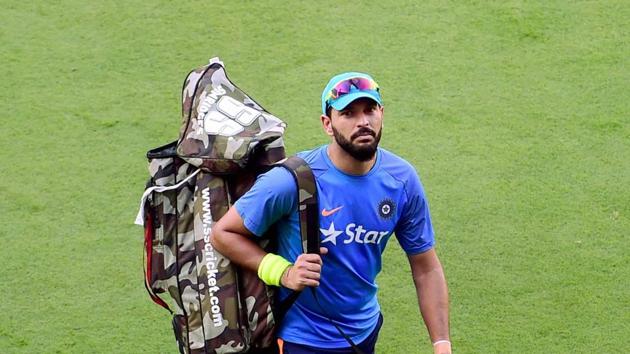 Yuvraj Singh prepares for practice as India gear up for the match against England. (PTI) Yuvraj Singh prepares for practice as India gear up for the match against England. (PTI)