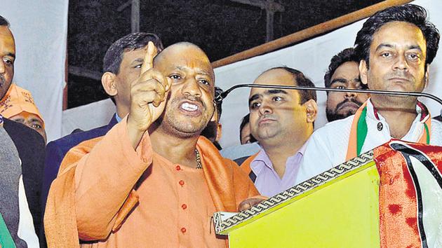 BJP leader Yogi Adityanath (in saffron kurta) at an election rally in Ghaziabad on Monday, January 30, 2016. At another public meeting in Bulandshahr, he endorsed US President Trump’s immigration curbs on travellers from seven Muslim-majority countries.(Sakib Ali / HT Photo) BJP leader Yogi Adityanath (in saffron kurta) at an election rally in Ghaziabad on Monday, January 30, 2016. At another public meeting in Bulandshahr, he endorsed US President Trump’s immigration curbs on travellers from seven Muslim-majority countries.(Sakib Ali / HT Photo)