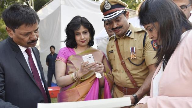 Wait and watch: IG Krishna Prakash with his wife Sanjana after the function. (Anshuman Poyrekar/HT PHOTO) 