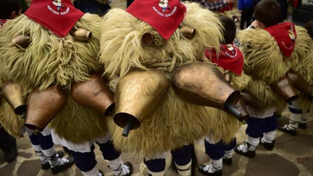 A group of young Joaldunaks rest during the carnival between the Pyrenees villages of Ituren and Zubieta, northern Spain. (AP photo) A group of young Joaldunaks rest during the carnival between the Pyrenees villages of Ituren and Zubieta, northern Spain. (AP photo)