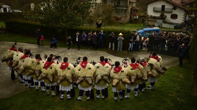 A group of Joaldunaks, called Zanpantzar, pose before the carnival between the Pyrenees villages of Ituren and Zubieta, northern Spain on Monday. Bell carrying dancers known as Joaldunak perform a ritual dance to ward off evil spirits and awaken the coming spring. (AP photo) A group of Joaldunaks, called Zanpantzar, pose before the carnival between the Pyrenees villages of Ituren and Zubieta, northern Spain on Monday. Bell carrying dancers known as Joaldunak perform a ritual dance to ward off evil spirits and awaken the coming spring. (AP photo)