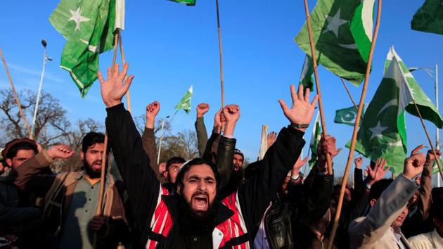 Supporters of Islamic charity organization Jamaat-ud-Dawa (JuD), chant slogans to condemn the house arrest of Hafiz Muhammad Saeed, chief of (JuD), during a demonstration in Islamabad, Pakistan, January 31.(REUTERS) Supporters of Islamic charity organization Jamaat-ud-Dawa (JuD), chant slogans to condemn the house arrest of Hafiz Muhammad Saeed, chief of (JuD), during a demonstration in Islamabad, Pakistan, January 31.(REUTERS)