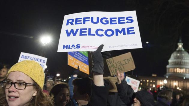 Demonstrators protest against US President Donald Trump's ban on travellers from seven countries, in Washington, DC.(AFP photo) Demonstrators protest against US President Donald Trump's ban on travellers from seven countries, in Washington, DC.(AFP photo)