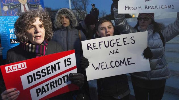 Demonstrators protest against US President Donald Trump and his administration's ban of travellers from seven countries, during a rally outside the US Supreme Court in Washington.(AFP Photo)