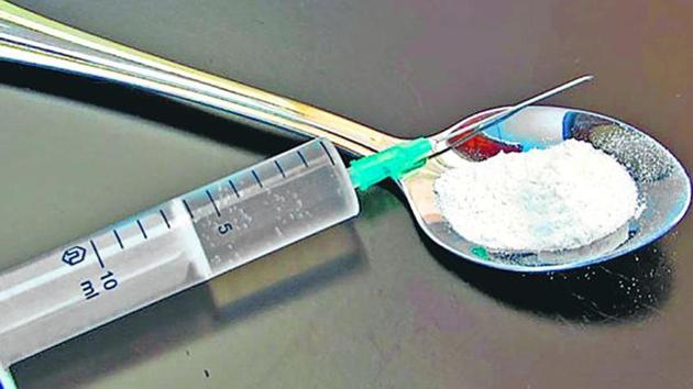 They were charged with four counts of conspiring to import heroin and methamphetamine into the US (HT photo) They were charged with four counts of conspiring to import heroin and methamphetamine into the US (HT photo)