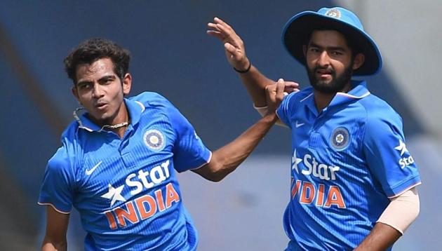 India U-19’s player Kamlesh Nagarkoti (L) and Shiva Singh celebrate the dismissal of an England U-19 batsman. (PTI) India U-19’s player Kamlesh Nagarkoti (L) and Shiva Singh celebrate the dismissal of an England U-19 batsman. (PTI)