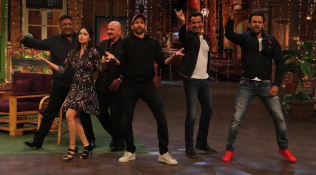 Director Sanjay Gupta, actors Yami Gautam, Hrithik Roshan, Ronit Roy, Rohit Roy and filmmaker Rakesh Roshan during the promotion of their film Kaabil on the sets of The Kapil Sharma Show on January 29. (Pramod Thakur/HT Photo)