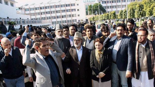 Opposition Congress and National Conference legislators protest during the budget session of the Jammu and Kashmir assembly in Jammu. (PTI photo) Opposition Congress and National Conference legislators protest during the budget session of the Jammu and Kashmir assembly in Jammu. (PTI photo)