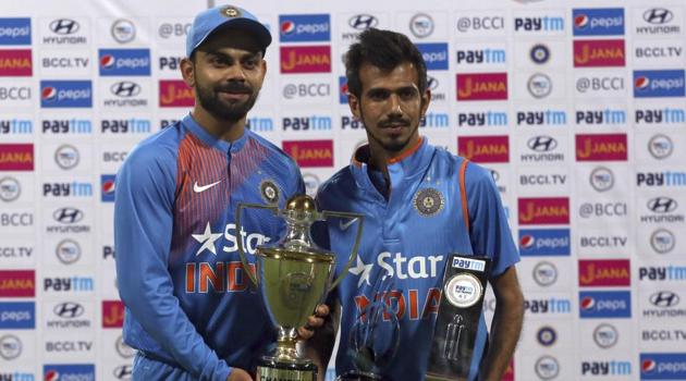 Yuzvendra Chahal picked up 6/25, the best haul by an Indian bowler in T20Is as Virat Kohli remained undefeated as captain after a thumping 75-run win over England at the M Chinnaswamy stadium. (AP) Yuzvendra Chahal picked up 6/25, the best haul by an Indian bowler in T20Is as Virat Kohli remained undefeated as captain after a thumping 75-run win over England at the M Chinnaswamy stadium. (AP)