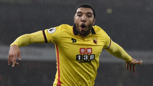 Watford's Troy Deeney celebrates scoring their second goal against Arsenal FC in their Premier League match on Tuesday. Arsenal lost 1-2 while leaders Chelsea FC played out a 1-1 draw vs Liverpool FC(REUTERS)