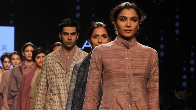 Models showcase the collection 11.11/Eleven Eleven by fashion designer Urvashi Kaur on Day 1 of  Lakmé  Fashion Week Summer /Resort 2017 at Jio Garden at Bandra Kurla Complex.  Urvashi Kaur is a New Delhi based label, with an organic, sustainable and artisanal focus.  Her collection is an exploration of indigenous Indian techniques and fabrics finds expression in a cross cultural, contemporary aesthetic.  (Pramod Thakur/HT PHOTO) 