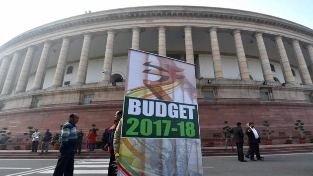 A hoarding put up at Parliament House in New Delhi on the day of budget presentation on Wednesday. (PTI) A hoarding put up at Parliament House in New Delhi on the day of budget presentation on Wednesday. (PTI)