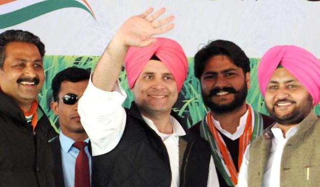 Congress vice-president Rahul Gandhi waves to the crowd during an elections rally at Dhuri in Sangrur District. (Bharat Bhushan/ HT PHOTO )