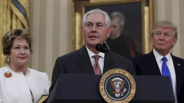 Rex Tillerson, flanked by his wife Renda St Clair, left, and President Donald Trump, right, speaks during a ceremony in the Oval Office of the White House in Washington, where he is sworn in as Secretary of State. (AP Photo) Rex Tillerson, flanked by his wife Renda St Clair, left, and President Donald Trump, right, speaks during a ceremony in the Oval Office of the White House in Washington, where he is sworn in as Secretary of State. (AP Photo)
