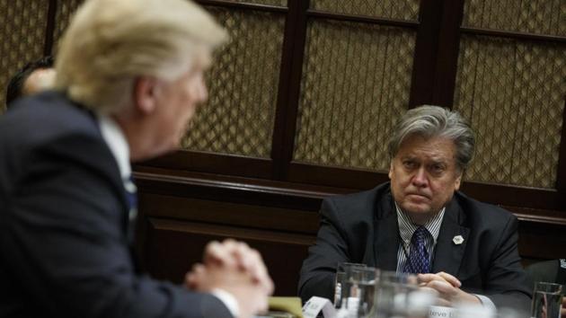 White House Chief Strategist Steve Bannon listens at right as President Donald Trump speaks during a meeting on cyber security in the Roosevelt Room of the White House in Washington. (AP Photo) White House Chief Strategist Steve Bannon listens at right as President Donald Trump speaks during a meeting on cyber security in the Roosevelt Room of the White House in Washington. (AP Photo)