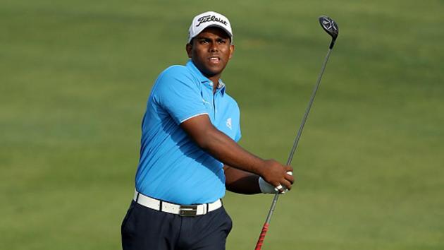 Rayhan Thomas plays his second shot on the par 5, 10th hole during the first round of the 2017 Omega Dubai Desert Classic.(Getty Images)