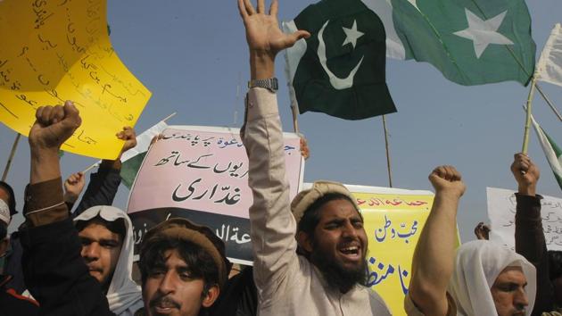 Supporters of Hafiz Saeed shout slogans to condemn his arrest, during a rally in Peshawar, Pakistan.(AP Photo) Supporters of Hafiz Saeed shout slogans to condemn his arrest, during a rally in Peshawar, Pakistan.(AP Photo)
