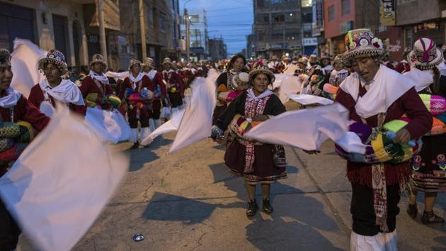 Dancers perform during Virgin of Candelaria celebrations in downtown Puno, Peru. "We have danced this way since the time of our grandparents," said 75 year-old Martin Mamani, who had made the trek from the village of Esmeralda. (Rodrigo Abd / AP)