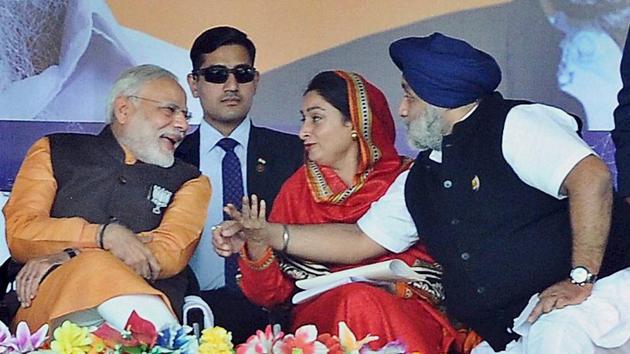 Prime Minster Narendra Modi, Punjab Dy CM Sukhbir Singh Badal and Union Food Processing Minister Harsimrat Kaur Badal during a BJP-SAD rally at Kotkapura in Faridkot . (PTI)