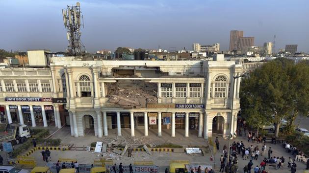 An empty section of a building above Jain Book Depot in C Block of Connaught Place collapsed on Thursday. (Ravi Choudhary/HT PHOTO) An empty section of a building above Jain Book Depot in C Block of Connaught Place collapsed on Thursday. (Ravi Choudhary/HT PHOTO)