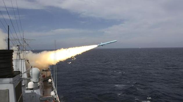 In this Monday, Aug. 1, 2016 photo released by Xinhua News Agency, a missile is launched from a guided-missile destroyer during a live ammunition drill in the East China Sea. (AP Photo) In this Monday, Aug. 1, 2016 photo released by Xinhua News Agency, a missile is launched from a guided-missile destroyer during a live ammunition drill in the East China Sea. (AP Photo)
