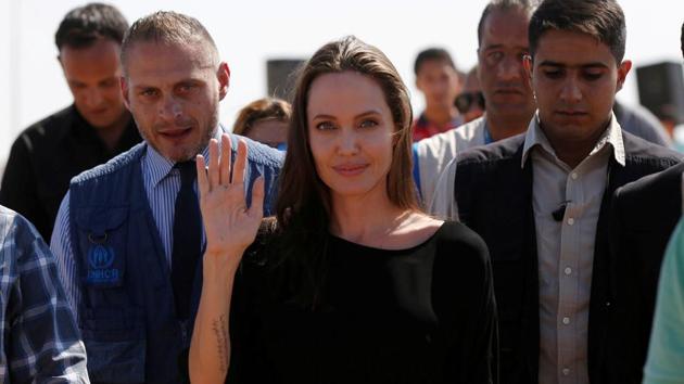 FILE PHOTO - Actress Angelina Jolie leaves after a news conference at Azraq refugee camp for Syrians displaced by conflict, near Al Azraq city, Jordan. (REUTERS) FILE PHOTO - Actress Angelina Jolie leaves after a news conference at Azraq refugee camp for Syrians displaced by conflict, near Al Azraq city, Jordan. (REUTERS)