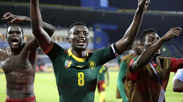 Cameroon players celebrate their victory in the African Cup of Nations semi-final against Ghana at the Stade de Renovation, in Franceville, Gabon on Thursday.(AP)