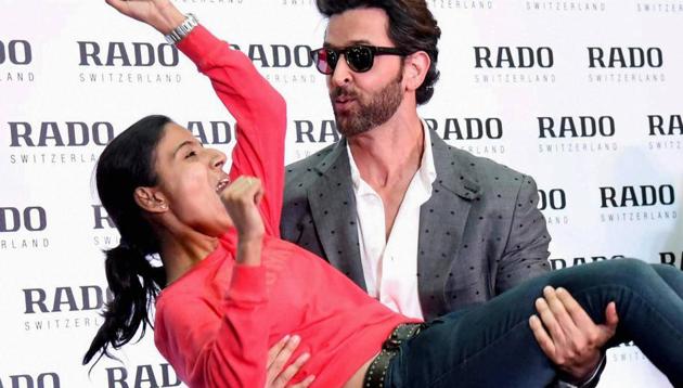 Hrithik Roshan with a fan during an event to promote Kaabil in Kochi. (PTI)