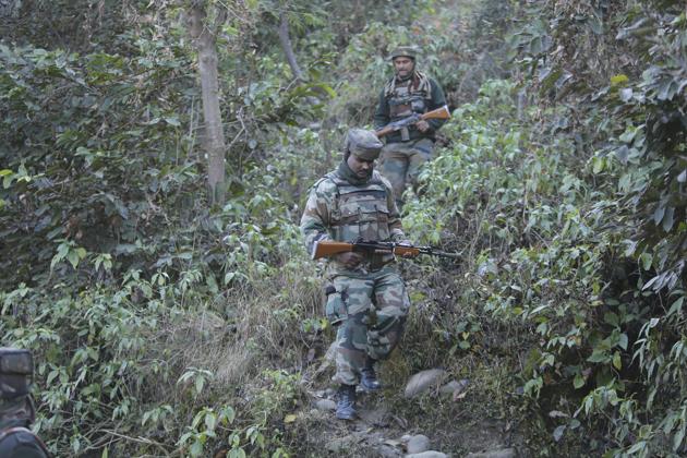 Soldiers patrol during a search operation in the frontier Battal area, about 90 km from Jammu.(AP File)