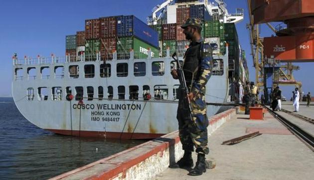 A Pakistan Navy soldier stands guard while a loaded Chinese ship is readied for departure prior to a ceremony at Gwadar port, about 435 miles, 700 km, west of Karachi. (AP) A Pakistan Navy soldier stands guard while a loaded Chinese ship is readied for departure prior to a ceremony at Gwadar port, about 435 miles, 700 km, west of Karachi. (AP)