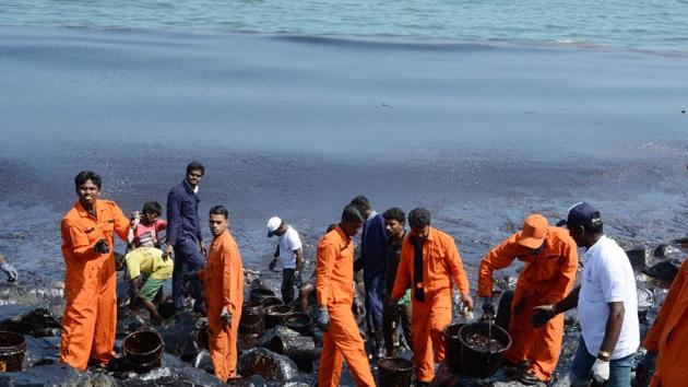 Coast Guard Pollution Response Team tackles the oil spill. Volunteers from engineering colleges, fishing communities have also joined the cleaning operations. 