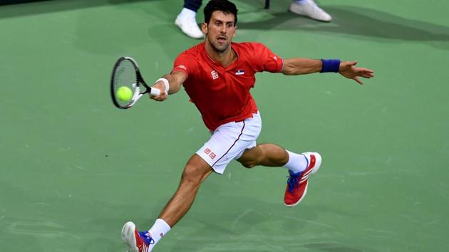 Novak Djokovic lost the first set and needed treatment on his shoulder but overcame the odds to defeat Daniil Medvedev and help Serbia take a 2-0 lead over Russia in the Davis Cup World Group encounter.(AFP) Novak Djokovic lost the first set and needed treatment on his shoulder but overcame the odds to defeat Daniil Medvedev and help Serbia take a 2-0 lead over Russia in the Davis Cup World Group encounter.(AFP)