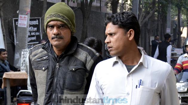 A photo of the man (in black jacket) who surrendered Ghaziabad court last week in connection with an Audi-auto rickshaw accident that claimed four lives . (HT Photo) A photo of the man (in black jacket) who surrendered Ghaziabad court last week in connection with an Audi-auto rickshaw accident that claimed four lives . (HT Photo)