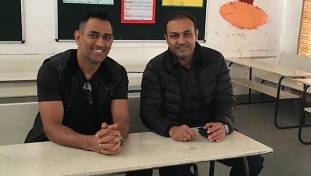 Mahendra Singh Dhoni recently visited the Virender Sehwag school to interact with students.(Virender Sehwag Instagram)