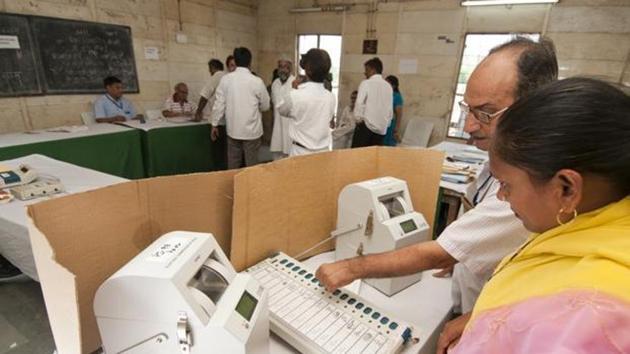 The paper-trail machine gives a receipt to the voter, verifying the vote went to in favour of the candidate against whose name the button was pressed on the electronic voting machine.(Livemint photo)