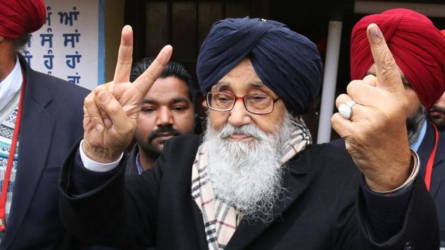 Chief minister Parkash Singh Badal showing the victory sign and his inked finger after casting his vote in Badal village in Lambi segment on Saturday. (Sanjeev Kumar/HT) Chief minister Parkash Singh Badal showing the victory sign and his inked finger after casting his vote in Badal village in Lambi segment on Saturday. (Sanjeev Kumar/HT)