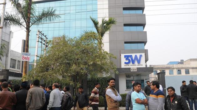 People gather outside Anubhav Mittal’s office 3W Digital Private Limited in Sector 63, Noida, on Saturday. (Burhaan Kinu/HT Photo) People gather outside Anubhav Mittal’s office 3W Digital Private Limited in Sector 63, Noida, on Saturday. (Burhaan Kinu/HT Photo)